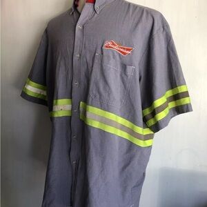 Men’s Budweiser uniform NWT! Blue w yellow safety stripe. Size Xl button down
